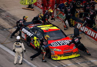 FORT WORTH, TX - NOVEMBER 08:  Jeff Gordon, driver of the #24 DuPont Chevrolet, pits during the NASCAR Sprint Cup Series Dickies 500 at Texas Motor Speedway on November 8, 2009 in Fort Worth, Texas.  (Photo by Chris Graythen/Getty Images)