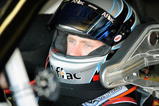FORT WORTH, TX - NOVEMBER 07:  Carl Edwards, driver of the #99 Aflac Ford, sits in his car during practice for the NASCAR Sprint Cup Series Dickies 500 at Texas Motor Speedway on November 7, 2009 in Fort Worth, Texas.  (Photo by John Harrelson/Getty Images for NASCAR)