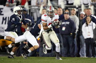 STATE COLLEGE, PA - NOVEMBER 7: Wide receiver DeVier Posey #8 of the Ohio State Buckeyes catches a 62 yard touchdown pass during a game against the Penn State Nittany Lions on November 7, 2009 at Beaver Stadium in State College, Pennsylvania. Ohio State won 24-7. (Photo by Hunter Martin/Getty Images)