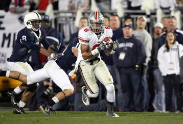 STATE COLLEGE, PA - NOVEMBER 7: Wide receiver DeVier Posey #8 of the Ohio State Buckeyes catches a 62 yard touchdown pass during a game against the Penn State Nittany Lions on November 7, 2009 at Beaver Stadium in State College, Pennsylvania. Ohio State won 24-7. (Photo by Hunter Martin/Getty Images)