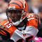 CLEVELAND - OCTOBER 04:  Chris Henry #15 of the Cincinnati Bengals runs the ball against the Cleveland Browns during their game at Cleveland Browns Stadium on October 4, 2009 in Cleveland, Ohio. The Bengals defeated the Browns 23-20 in overtime.  (Photo by Jim McIsaac/Getty Images)