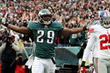 PHILADELPHIA - NOVEMBER 01:  LeSean McCoy #29 of the Philadelphia Eagles celebrates his touchdown as Bruce Johnson #25 of the New York Giants looks on on November 1, 2009 at Lincoln Financial Field in Philadelphia, Pennsylvania. The Eagles defeated the Giants 40-17.  (Photo by Jim McIsaac/Getty Images)