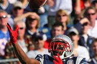 FOXBORO, MA - NOVEMBER 8: Randy Moss #81 of the New England Patriots catches a pass during a game against the Miami Dolphins at Gillette Stadium on November 8, 2009 in Foxboro, Massachusetts. The Patriots won 27-17. (Photo by Jim Rogash/Getty Images)