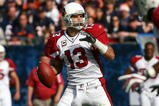 CHICAGO - NOVEMBER 08: Kurt Warner #13 of the Arizona Cardinals looks for a receiver against the Chicago Bears at Soldier Field on November 8, 2009 in Chicago, Illinois. The Cardinals defeated the Bears 41-21. (Photo by Jonathan Daniel/Getty Images)