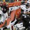CINCINNATI - NOVEMBER 8: Carson Palmer #9 of the Cincinnati Bengals throws under pressure from the Baltimore Ravens at Paul Brown Stadium on November 8, 2009 in Cincinnati, Ohio.  (Photo by John Sommers II/Getty Images)