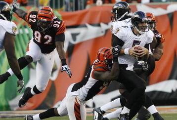CINCINNATI - NOVEMBER 8: Carson Palmer #9 of the Cincinnati Bengals throws under pressure from the Baltimore Ravens at Paul Brown Stadium on November 8, 2009 in Cincinnati, Ohio.  (Photo by John Sommers II/Getty Images)