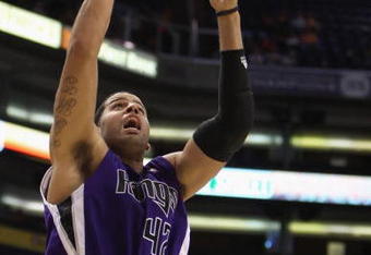 PHOENIX - OCTOBER 20:  Sean May #42 of the Sacramento Kings lays up a shot against the Phoenix Suns during the NBA preseason game at US Airways Center on October 20, 2009 in Phoenix, Arizona. The Suns defeated the Kings 143-127.  NOTE TO USER: User expressly acknowledges and agrees that, by downloading and or using this photograph, User is consenting to the terms and conditions of the Getty Images License Agreement.  (Photo by Christian Petersen/Getty Images)
