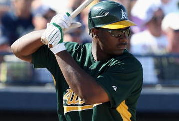 PEORIA, AZ - MARCH 07:  Chris Carter #75 of the Oakland Athletics bats against the San Diego Padres during the spring training game at Peoria Stadium on March 7, 2009 in Peoria, Arizona  The A's defeated the Padres 15-6.  (Photo by Christian Petersen/Getty Images)