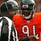 CHICAGO - NOVEMBER 01: Tommie Harris #91 of the Chicago Bears jokes with umpire Roy Ellison #81 during a game against the Cleveland Browns at Soldier Field on November 1, 2009 in Chicago, Illinois. The Bears defeated the Browns 30-6. (Photo by Jonathan Daniel/Getty Images)