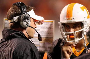 KNOXVILLE, TN - OCTOBER 31:  Head coach Lane Kiffen of the Tennessee Volunteers talks to his quarterback Jonathan Crompton #8 during a break against the South Carolina Gamecocks at Neyland Stadium on October 31, 2009 in Knoxville, Tennessee.  (Photo by Streeter Lecka/Getty Images)