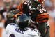 CINCINNATI - NOVEMBER 8: Chad Ochocinco #85 of the Cincinnati Bengals is tackled by Ed Reed #20 of the Baltimore Ravens at Paul Brown Stadium on November 8, 2009 in Cincinnati, Ohio. (Photo by John Sommers II/Getty Images)