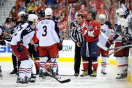 WASHINGTON - NOVEMBER 01: Alex Ovechkin #8 of the Washington Capitals is escorted to the penalty box after receiving a roughing penalty in the second period against the Columbus Blue Jackets at the Verizon Center on November 1, 2009 in Washington, DC. (Photo by Greg Fiume/Getty Images)
