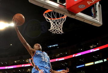 LOS ANGELES, CA - FEBRUARY 10:  Kevin Durant #35 of the Oklahoma City Thunder goes up for a shot over Lamar Odom #7 of the Los Angeles Lakers on February 10, 2009 at Staples Center in Los Angeles, California.  The Lakers won 105-98.   NOTE TO USER: User expressly acknowledges and agrees that, by downloading and/or using this Photograph, user is consenting to the terms and conditions of the Getty Images License Agreement.  (Photo by Stephen Dunn/Getty Images)