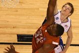 GREENSBORO, NC - MARCH 21:  Kyle Singler #12 of the Duke Blue Devils defends the basket against Dexter Pittman #34 of the Texas Longhorns during the second round of the NCAA Division I Men's Basketball Tournament at the Greensboro Coliseum on March 21, 2009 in Greensboro, North Carolina.  (Photo by Streeter Lecka/Getty Images)