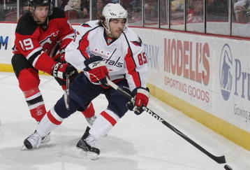 NEWARK, NJ - NOVEMBER 04: Mathieu Perreault #85 of the Washington Capitals skates in his first NHL game against the New Jersey Devils at the Prudential Center on November 4, 2009 in Newark, New Jersey. (Photo by Bruce Bennett/Getty Images)