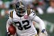 EAST RUTHERFORD, NJ - NOVEMBER 01: Justin Miller #32 of the New York Jets runs with ball against the Miami Dolphins at Giants Stadium on November 1, 2009 in East Rutherford, New Jersey. The Dolphins defeated the Jets 30-25. (Photo by Chris Trotman/Getty Images)