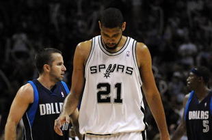 SAN ANTONIO - APRIL 28:   Forward Tim Duncan #21 of the San Antonio Spurs reacts during a 106-93 loss against the Dallas Mavericks in Game Five of the Western Conference Quarterfinals during the 2009 NBA Playoffs at AT&T Center on April 28, 2009 in San Antonio, Texas. NOTE TO USER: User expressly acknowledges and agrees that, by downloading and or using this photograph, User is consenting to the terms and conditions of the Getty Images License Agreement.  (Photo by Ronald Martinez/Getty Images)