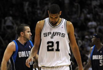 SAN ANTONIO - APRIL 28:   Forward Tim Duncan #21 of the San Antonio Spurs reacts during a 106-93 loss against the Dallas Mavericks in Game Five of the Western Conference Quarterfinals during the 2009 NBA Playoffs at AT&T Center on April 28, 2009 in San Antonio, Texas. NOTE TO USER: User expressly acknowledges and agrees that, by downloading and or using this photograph, User is consenting to the terms and conditions of the Getty Images License Agreement.  (Photo by Ronald Martinez/Getty Images)