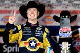 FORT WORTH, TX - NOVEMBER 08:  Kurt Busch, driver of the #2 Miller Lite Dodge, poses with the trophy on victory lane after winning the NASCAR Sprint Cup Series Dickies 500 at Texas Motor Speedway on November 8, 2009 in Fort Worth, Texas.  (Photo by Rusty Jarrett/Getty Images for NASCAR)