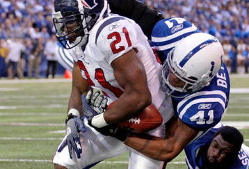 INDIANAPOLIS - NOVEMBER 08:  Antoine Bethea #41 of the Indianapolis Colts causes a fumble as he tackles  Ryan Moats #21 of the Houston Texans during the NFL game at Lucas Oil Stadium on November 8, 2009 in Indianapolis, Indiana. The Colts won 20-17.  (Photo by Andy Lyons/Getty Images)