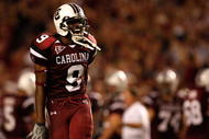 COLUMBIA, SC - SEPTEMBER 24:  Moe Brown #9 of the South Carolina Gamecocks celebrates with fans after a 16-10 victory over the Ole Miss Rebels after their game at Williams-Brice Stadium on September 24, 2009 in Columbia, South Carolina.  (Photo by Streeter Lecka/Getty Images)