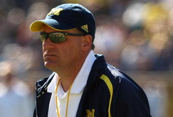 ANN ARBOR, MI - SEPTEMBER 19:  Head coach Rich Rodriguez of the Michigan Wolverines watches warmups before the game with the Eastern Michigan Eagles at Michigan Stadium on September 19, 2009 in Ann Arbor, Michigan.  Michigan won 45-17.  (Photo by Stephen Dunn/Getty Images)