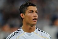 MADRID, SPAIN - SEPTEMBER 30: Cristiano Ronaldo of Real Madrid looks on prior to the Champions League group C match between Real Madrid and Marseille at the Estadio Santiago Bernabeu on September 30, 2009 in Madrid, Spain. Real Madrid won the match 3-0. (Photo by Jasper Juinen/Getty Images)