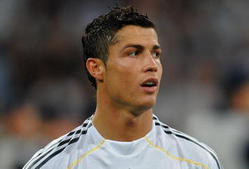 MADRID, SPAIN - SEPTEMBER 30:  Cristiano Ronaldo of Real Madrid looks on prior to the Champions League group C match between Real Madrid and Marseille at the Estadio Santiago Bernabeu on September 30, 2009 in Madrid, Spain. Real Madrid won the match 3-0.  (Photo by Jasper Juinen/Getty Images)