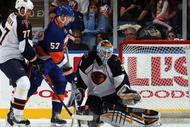 UNIONDALE, NY - NOVEMBER 07: Ondrej Pavelec #31of the Atlanta Thrashers surrenders a goal to Jack Hillen (not pictured) of the New York Islanders as Pavel Kubina #77 of Atlanta defends against Blake Comeau #57 on November 7, 2009 at Nassau Coliseum in Uniondale, New York. (Photo by Jim McIsaac/Getty Images)