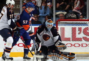 UNIONDALE, NY - NOVEMBER 07:  Ondrej Pavelec #31of the Atlanta Thrashers surrenders a goal to Jack Hillen (not pictured) of the New York Islanders as Pavel Kubina #77 of Atlanta defends against Blake Comeau #57 on November 7, 2009 at Nassau Coliseum in Uniondale, New York.  (Photo by Jim McIsaac/Getty Images)