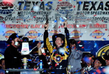 FORT WORTH, TX - NOVEMBER 08:  Kurt Busch, driver of the #2 Miller Lite Dodge, celebrates by firing two Beretta's into the air on victory lane after winning the NASCAR Sprint Cup Series Dickies 500 at Texas Motor Speedway on November 8, 2009 in Fort Worth, Texas.  (Photo by Rusty Jarrett/Getty Images for NASCAR)