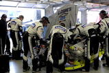 FORT WORTH, TX - NOVEMBER 08:  Crew members for Jimmie Johnson, driver of the #48 Lowe's Chevrolet, work on the car after being involved in a crash with Sam Hornish Jr., driver of the #77 AAA Dodge, during the NASCAR Sprint Cup Series Dickies 500 at Texas Motor Speedway on November 8, 2009 in Fort Worth, Texas.  (Photo by Rusty Jarrett/Getty Images for NASCAR)