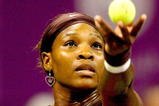 DOHA, QATAR - NOVEMBER 01:  Serena Williams of the United States serves to Venus Williams of the United States during the final of the Sony Ericsson WTA Championships at the Khalifa International Tennis and Squash Complex on November 1, 2009 in Doha, Qatar.  (Photo by Matthew Stockman/Getty Images)