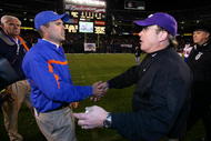 SAN DIEGO, CA - DECEMBER 23: Head Coach Chris Petersen of the Boise State Broncos meets Heads Coach Gary Patterson of TCU Horned Frogs after the Horned Frogs 17-16 win over the Broncos during the San Diego County Credit Union Poinsettia Bowl at Qualcomm Stadium on December 23, 2008 in San Diego, California. (Photo by Donald Miralle/Getty Images)
