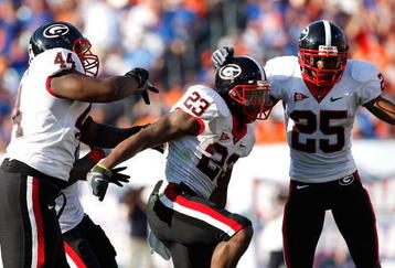 JACKSONVILLE, FL - OCTOBER 31:  The Georgia Bulldogs defense celebrates against the Florida Gators at Jacksonville Municipal Stadium on October 31, 2009 in Jacksonville, Florida.  (Photo by Kevin C. Cox/Getty Images)