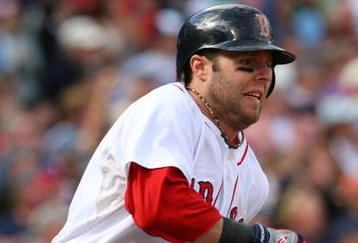 BOSTON - OCTOBER 11:  Dustin Pedroia #15 of the Boston Red Sox rounds the bases after hitting a two-run double in the third inning against the Los Angeles Angels of Anaheim in Game Three of the ALDS during the 2009 MLB Playoffs at Fenway Park on October 11, 2009 in Boston,  Massachusetts. (Photo by Jim Rogash/Getty Images)