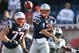 FOXBORO, MA - NOVEMBER 8:  Tom Brady #12 of the New England Patriots throws against the Miami Dolphins at Gillette Stadium on November 8, 2009 in Foxboro, Massachusetts.  (Photo by Jim Rogash/Getty Images)