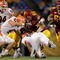 MINNEAPOLIS, MN - NOVEMBER 03:  Quarterback Adam Weber #8 of the Minnesota Golden Gophers is sacked by Antonio James #90 of the Illinois Fighting Illini as J Leman #47 of the Illini and Steve Shindell #64 of the Gophers join the play at the Hubert H. Humphrey Metrodome on November 3, 2007 in Minneapolis, Minnesota.  (Photo by Doug Pensinger/Getty Images)