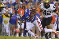 GAINESVILLE, FL - NOVEMBER 7: Running back Brandon James #25  of the Florida Gators rushes upfield against the Vanderbilt Commodores  November 7, 2009 at Ben Hill Griffin Stadium in Gainesville, Florida.  (Photo by Al Messerschmidt/Getty Images)