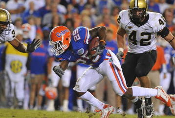 GAINESVILLE, FL - NOVEMBER 7: Running back Brandon James #25  of the Florida Gators rushes upfield against the Vanderbilt Commodores  November 7, 2009 at Ben Hill Griffin Stadium in Gainesville, Florida.  (Photo by Al Messerschmidt/Getty Images)