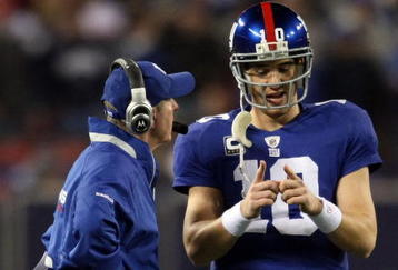 EAST RUTHERFORD, NJ - NOVEMBER 08:  Head coach Tom Coughlin of the New York Giants talks with Eli Manning #10 against the San Diego Chargers at Giants Stadium on November 8, 2009 in East Rutherford, New Jersey.  (Photo by Nick Laham/Getty Images)