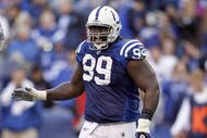 INDIANAPOLIS - NOVEMBER 01:  Antonio Johnson #93 of the Indianapolis Colts celebrates after defensive stop during the NFL game against the San Francisco 49ers at Lucas Oil Stadium on November 1, 2009 in Indianapolis, Indiana. The Colts won 18-14. (Photo by Andy Lyons/Getty Images)