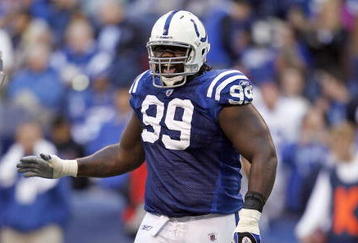 INDIANAPOLIS - NOVEMBER 01:  Antonio Johnson #93 of the Indianapolis Colts celebrates after defensive stop during the NFL game against the San Francisco 49ers at Lucas Oil Stadium on November 1, 2009 in Indianapolis, Indiana. The Colts won 18-14. (Photo by Andy Lyons/Getty Images)