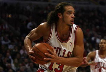 CHICAGO - NOVEMBER 03: Joakim Noah #13 of the Chicago Bulls looks to pass after grabbing a rebound against the Milwaukee Bucks at the United Center on November 3, 2009 in Chicago, Illinois. The Bulls defeated the Bucks 83-81. (Photo by Jonathan Daniel/Getty Images)