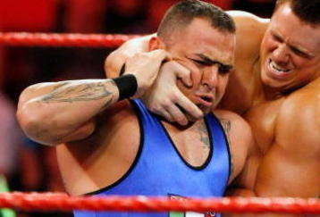 LAS VEGAS - AUGUST 24:  Wrestlers Santino Marella (L) and The Miz compete during the WWE Monday Night Raw show at the Thomas & Mack Center August 24, 2009 in Las Vegas, Nevada.  (Photo by Ethan Miller/Getty Images)