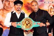 BEVERLY HILLS, CA - SEPTEMBER 14:  Manny Pacquiao and  Miguel Cotto pose for pictures during the press conference at the Beverly Hills Hotel on September 14, 2009 in Beverly Hills, California.  (Photo by Jacob de Golish/Getty Images)