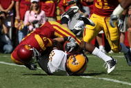 LOS ANGELES, CA - OCTOBER 11: Linebacker Mike Nixon #25 of the Arizona State Sun Devils is tackled by wide receiver Ronald Johnson #8 after maiking an interception on October 10, 2008 at the Los Angeles Coliseum in Los Angeles, California. usc WON 28-0. (Photo by Stephen Dunn/Getty Images)