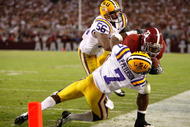 TUSCALOOSA, AL - NOVEMBER 07: Patrick Peterson #7 of the Louisiana State University Tigers tackles Mark Ingram #22 of the Alabama Crimson Tide at Bryant-Denny Stadium on November 7, 2009 in Tuscaloosa, Alabama. (Photo by Kevin C. Cox/Getty Images)
