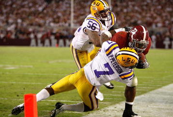 TUSCALOOSA, AL - NOVEMBER 07:  Patrick Peterson #7 of the Louisiana State University Tigers tackles Mark Ingram #22 of the Alabama Crimson Tide at Bryant-Denny Stadium on November 7, 2009 in Tuscaloosa, Alabama.  (Photo by Kevin C. Cox/Getty Images)