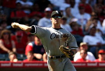 ANAHEIM, CA - SEPTEMBER 12: Third baseman Gordon Beckham #15 the Chicago White Sox throws out Torii Hunter of the Los Angeles Angels of Anaheim on a bunt in the sixth inning on September 12, 2009 at Angel Stadium in Anaheim, California.  The White Sox won 4-3 in 10 innings.  (Photo by Stephen Dunn/Getty Images)